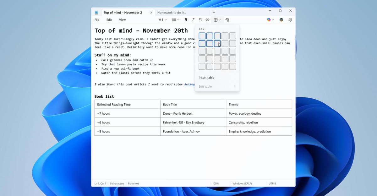 Capture d’écran de Notepad sous Windows 11 affichant tableaux intégrés et réponses IA en streaming dans l’interface