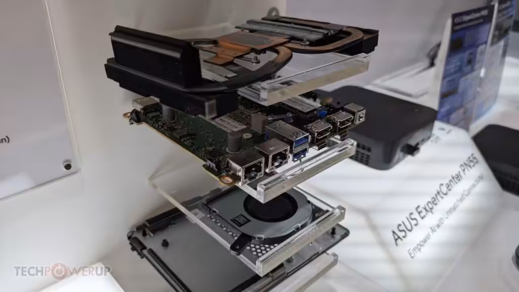 Vue éclatée des composants internes du ASUS NUC 16 Pro, incluant carte mère et dissipateur.