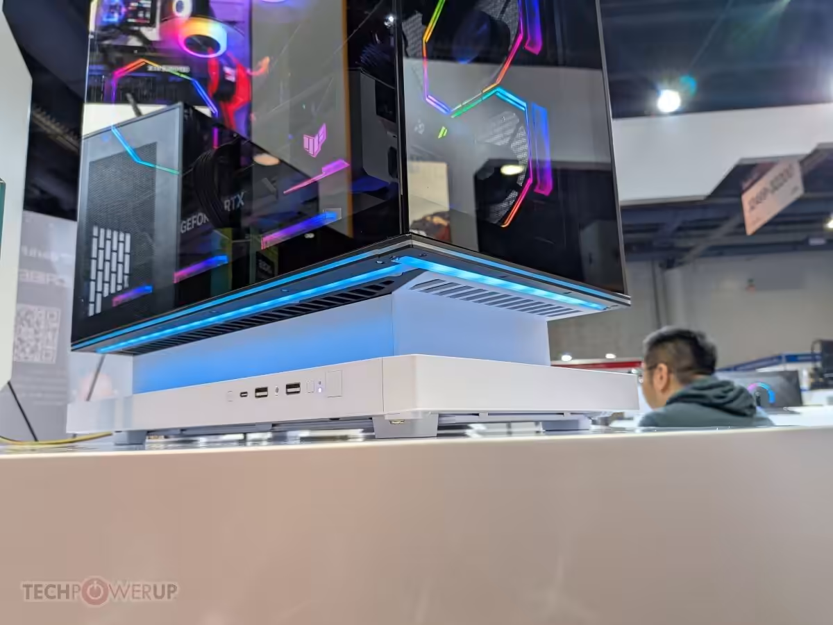 Détail du boîtier darkFlash montrant ports USB et éclairage LED sur le socle