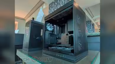 Boîtier PC Bitspower CA100 ouvert avec ventilateurs visibles.