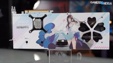 Carte Yeston RX 9070 avec illustration Waifu fond noir, position sur support.