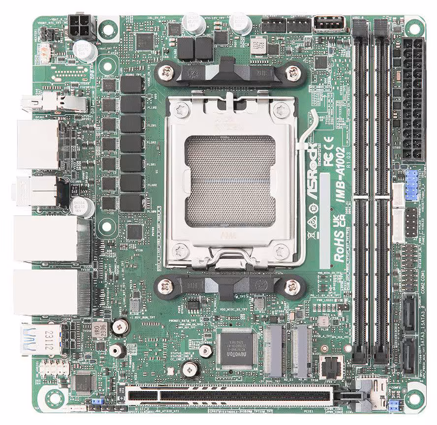 Vue de dessus de la carte mère ASRock IMB-A1002 avec socket CPU et circuits intégrés apparents.