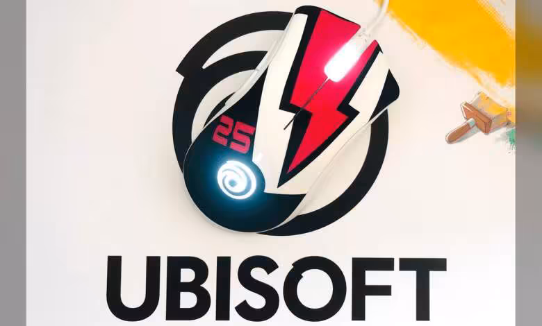 Ubisoft réduit ses coûts : Red Storm passe en support et 105 postes supprimés 1 Souris graphique Ubisoft avec design éclair et logo sur fond blanc