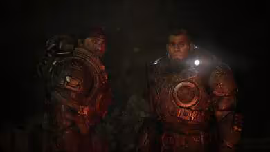 Deux personnages en armure dans un environnement sombre du jeu Gears of War