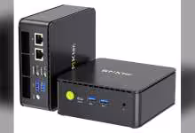 Mini PC GMKtec NucBox G11 avec ports et logo visibles sur surface noire.