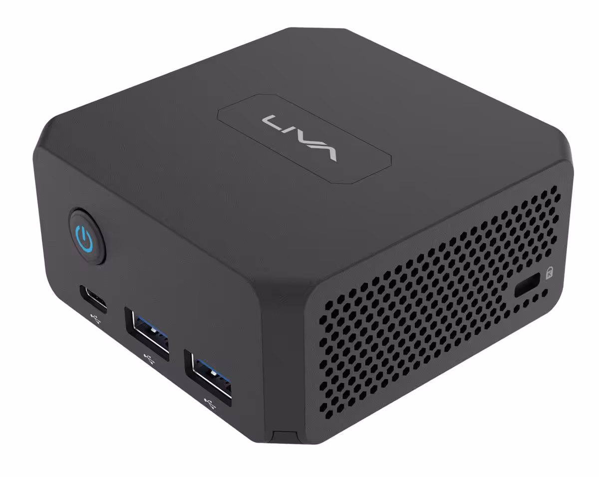 ECS COMPUTEX 2026 : LIVA, cartes mères et IA locale au cœur du salon de Taipei 3 Mini PC ECS LIVA compact, logo LIVA sur le dessus, ports USB et ventilation perforée