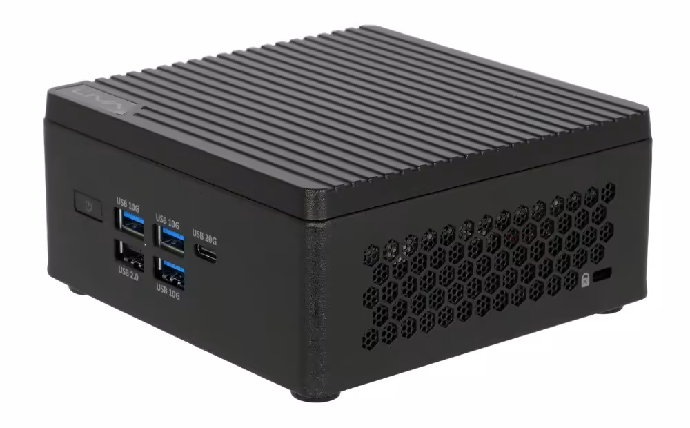 ECS COMPUTEX 2026 : LIVA, cartes mères et IA locale au cœur du salon de Taipei 4 Mini PC ECS noir avec façade USB 3.0, USB-C et grille d’aération latérale