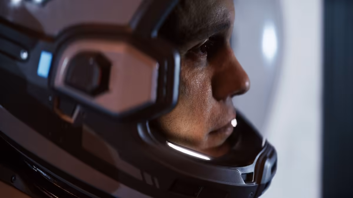 Gros plan du visage d’un homme dans un casque de pilote futuriste, style science-fiction