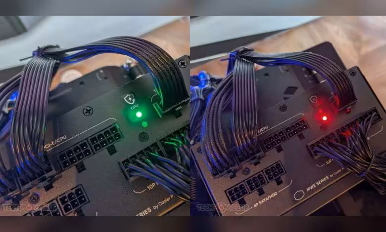 GPU Shield intégré aux Cooler Master MWE Gold V4 pour surveiller le 12V-2x6 1 Connecteurs d'alimentation sur une carte mère avec voyants LED vert et rouge.