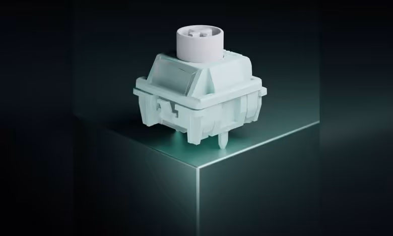 Gateron Magnetic Jade Silent : un switch magnétique silencieux pour claviers HE et TMR 1 Switch mécanique magnétique Gateron Jade Silent vert menthe, rendu produit sur fond sombre