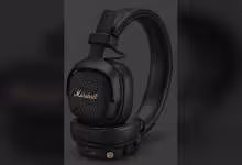 Casque Marshall Milton A.N.C. noir, vue produit sur fond gris, logo Marshall doré visible.