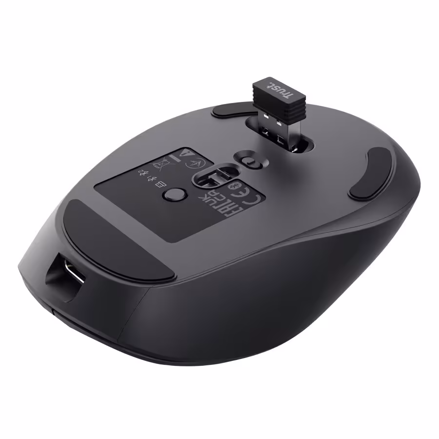 Trust Zevo : une souris bureautique rechargeable en 3 minutes pour 24 jours d’autonomie 3 Souris Trust Zevo vue dessous, avec dongle USB sans fil et compartiment de rangement