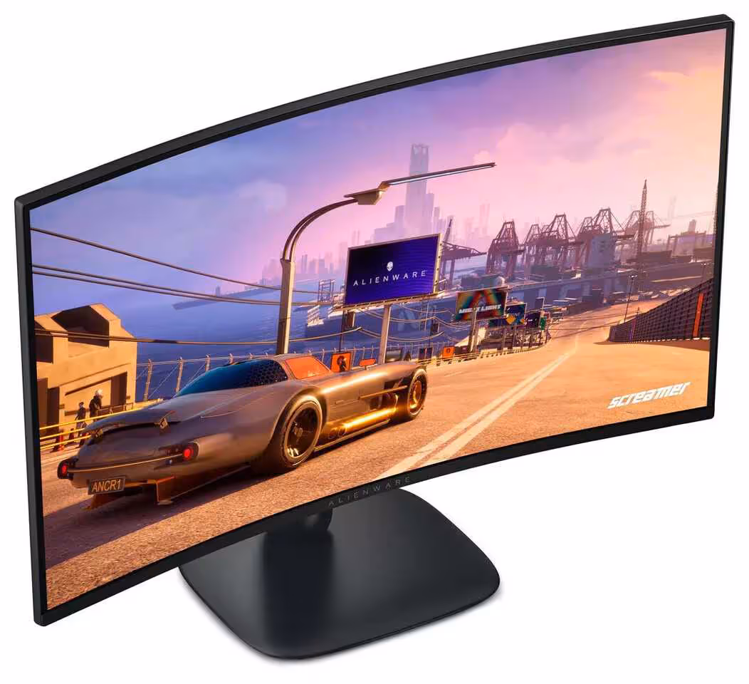 Alienware 30 ans : quatre moniteurs gaming dévoilés à la Computex 2026, dont un OLED 5K 39 pouces 9 Moniteur Alienware incurvé ultra-large affichant une course automobile au coucher du soleil, sur pied noir.