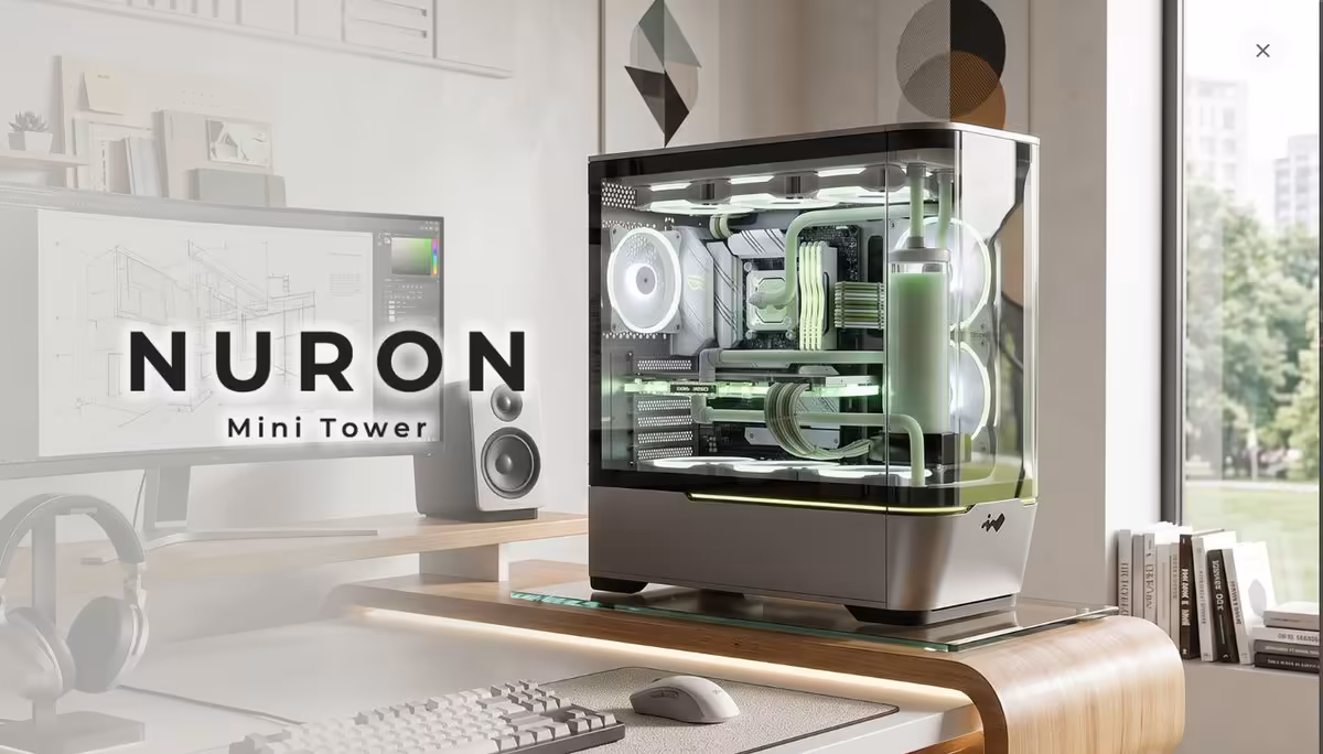 InWin Nuron : le boîtier Micro-ATX vitrine qui sacrifie l’avant à son verre 6 Illustration InWin Nuron Micro-ATX sur bureau, boîtier vitrine avec éclairage vert intégré et verre panoramique