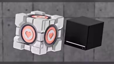 Deux cubes avec motifs cœur sur un fond gris béton, orientation légèrement différente.