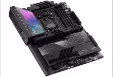 Carte mère ASUS ROG noir avec dissipateurs massifs et éclairage RGB, vue produit sur fond blanc