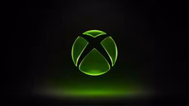 Logo Xbox vert lumineux sur fond noir, style minimaliste avec halo lumineux sous l’icône