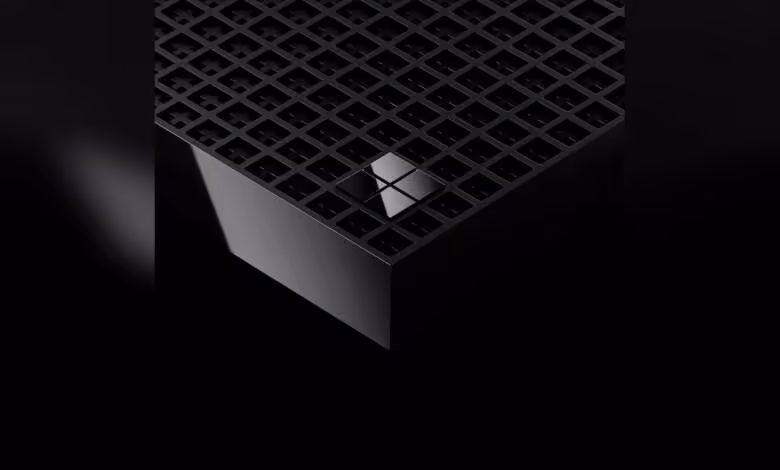 Surface RTX Spark Dev Box : Microsoft prépare un mini PC IA local avec 128 Go 1 Grille noire élégante de PC mini Surface RTX, éclat réfléchissant, fond sombre