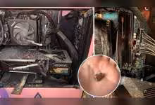PC gaming Aorus avec carte graphique impactée balle, intérieur sombre, détails contrastés