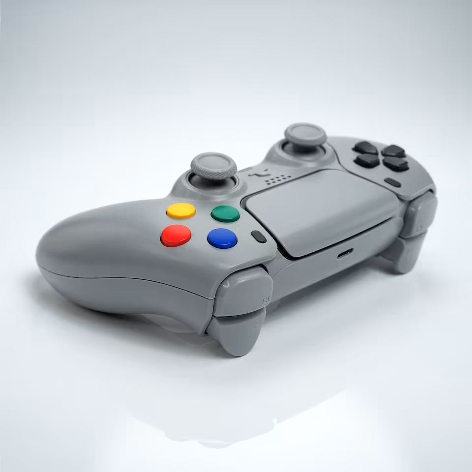 SFC-1 : Killscreen habille la manette PS5 et PC aux couleurs de la Super Famicom 3 Manette grise style rétro avec boutons multicolores, vue trois quarts sur fond blanc
