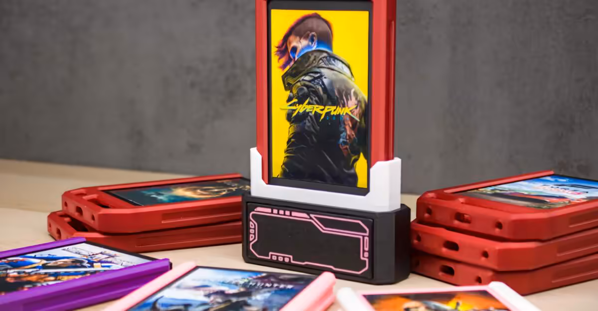 Cartouches Steam sur SSD SATA : un mod PC lance les jeux via un dock 2,5 pouces 2 Cartouches Steam custom rouges et violettes présentant Cyberpunk, contraste fort et cadrage net