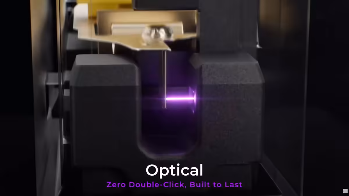Schéma de switch optique Keychron avec légende « Optical » et faisceau lumineux violet dans le mécanisme