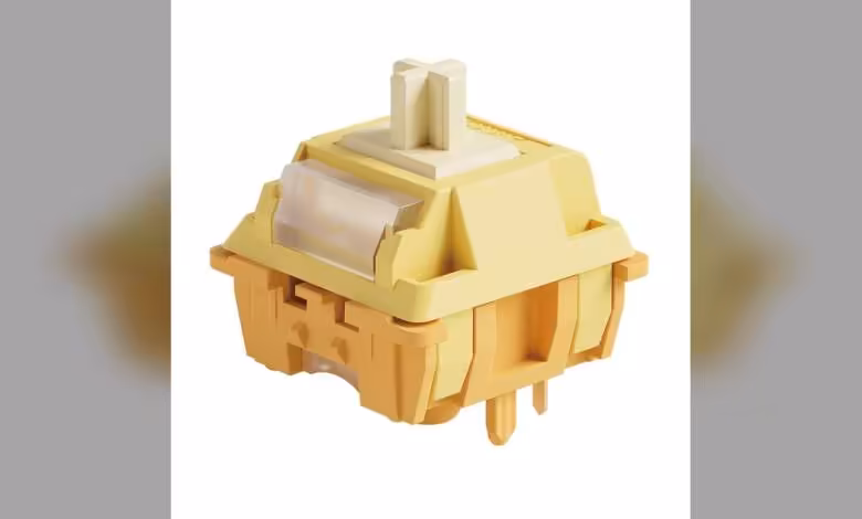 Akko U1 : la nouvelle gamme de switches mécaniques débute avec le Creamy Yellow 1 Switch mécanique Akko U1 jaune, vue produit isolée sur fond blanc