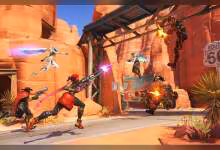 Scène de combat stylisée dans Overwatch, avec plusieurs héros et un panneau Route 66.