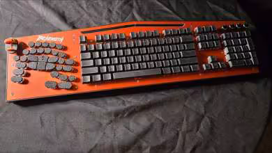 Clavier mécanique Behemoth V2 orange, format 135 %, avec touches rotatives à gauche