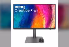 Écran BenQ Creative Pro sur pied, affichant une image colorée, avec molette de commande sur le socle