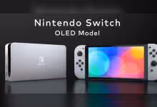 Console Nintendo Switch modèle OLED avec manettes Joy-Con grises sur fond noir.