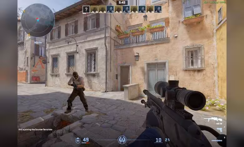 RADV Windows : Valve finance le portage du pilote Vulkan open source AMD 1 Capture d’écran d’un jeu de tir à la première personne, fusil sniper en main, interface HUD visible, village méditerranéen.