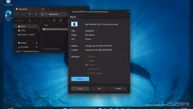 Fenêtre Propriétés Windows 11 sombre sur le Bureau, avec Explorateur de fichiers et fond d’écran bleu visibles