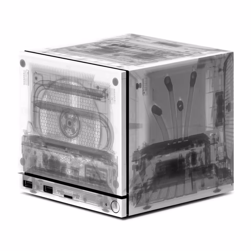 Vue en rayons X d’une Steam Machine carrée, composants internes visibles sous coque translucide