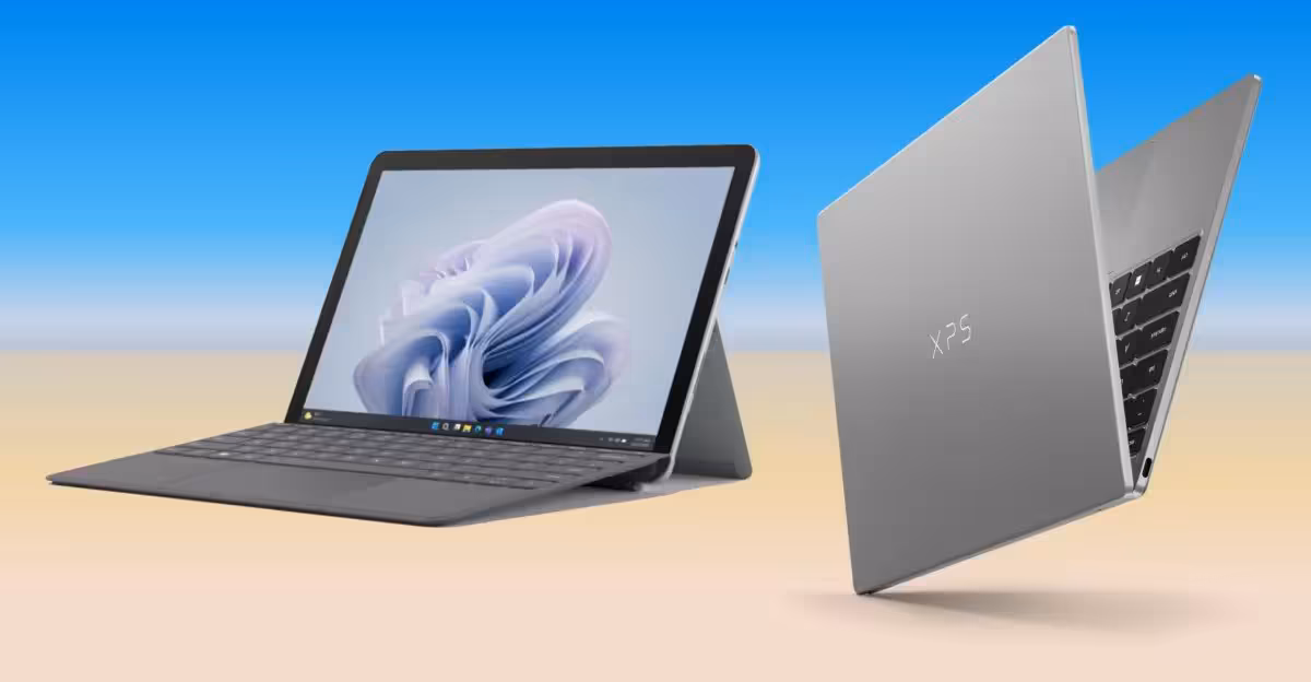 Laptops XPS argentés avec fond estival ciel bleu et sable.