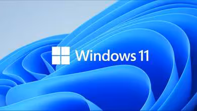 Fond d’écran Windows 11 bleu avec logo Microsoft et texte Windows 11 au centre
