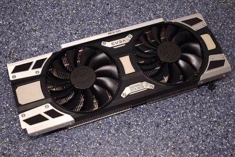 Carte graphique EVGA GeForce GTX 1080 Ti ACX 3.0 à double ventilateur sur fond texturé