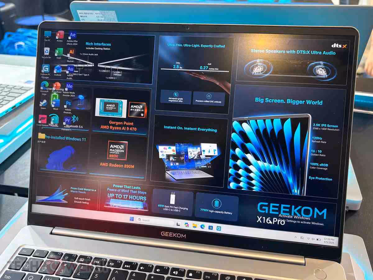 Écran du GEEKOM X16 Pro affichant une interface de démonstration avec mentions AMD, DTS et 16 pouces