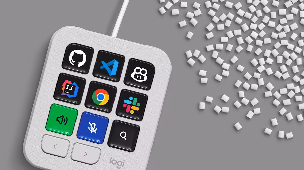 Pavé Logitech MX Keypad blanc, vue de dessus avec touches personnalisables et fond gris
