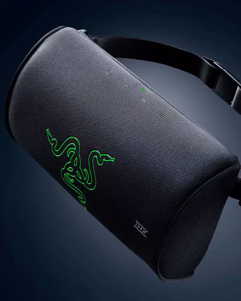 Razer Clio X : un coussin audio THX Spatial pour chaise gaming à l'essai à la PAX West 2026 3 Coussin audio Razer noir incliné, logo vert THX visible, tissu texturé et format ergonomique