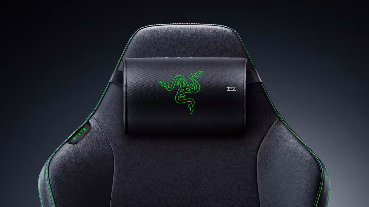 Razer Clio X : un coussin audio THX Spatial pour chaise gaming à l'essai à la PAX West 2026 2 Coussin audio Razer noir avec logo vert, vue frontale, design pour dossier de chaise gaming