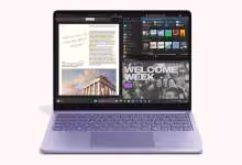 Ordinateur portable Microsoft Surface violet affichant Windows avec applications et documents ouverts