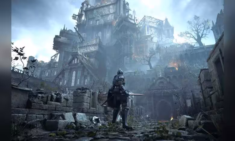 KyTyPS5 atteint 30 FPS sur Demon's Souls Remake et accélère à une vitesse folle 1 Capture de Demon's Souls Remake sur PS5 avec personnage en armure devant un château gothique brumeux