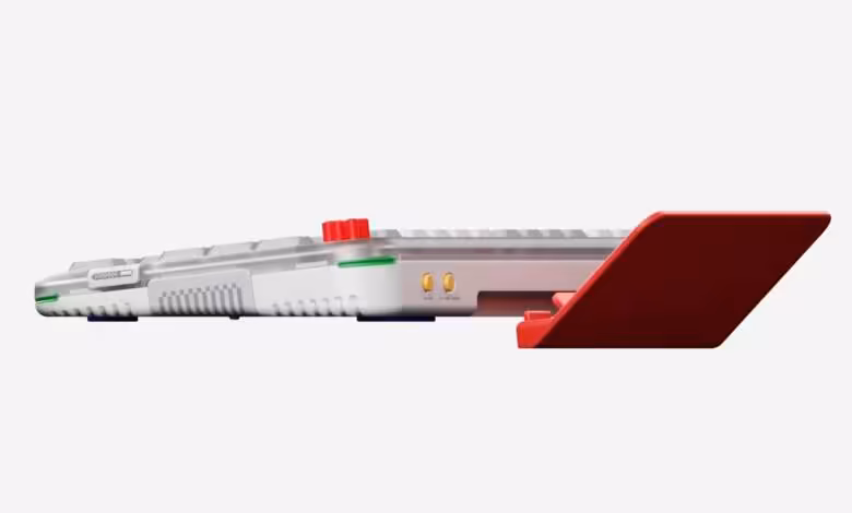 NuPhyLab ouvre ses modèles 3D aux possesseurs de claviers NuPhy et aux moddeurs 1 Rendu 3D d’un accessoire NuPhy blanc et rouge, profil latéral sur fond gris clair