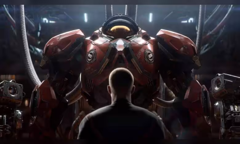 StarCraft : le nouveau shooter de Blizzard ne sera pas une exclusivité Xbox 1 Soldat Terran en armure de combat rouge face à un imposant mécha dans un hangar futuriste StarCraft