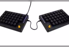 Clavier split Tiwaz noir en deux modules reliés par câble, vue produit sur fond blanc