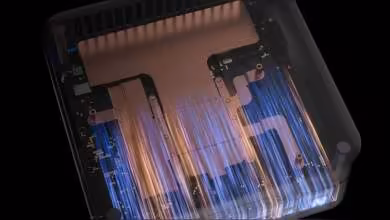 Refroidisseur VZMORE V-Cooling transparent montrant chambre à vapeur en cuivre et caloducs internes bleus