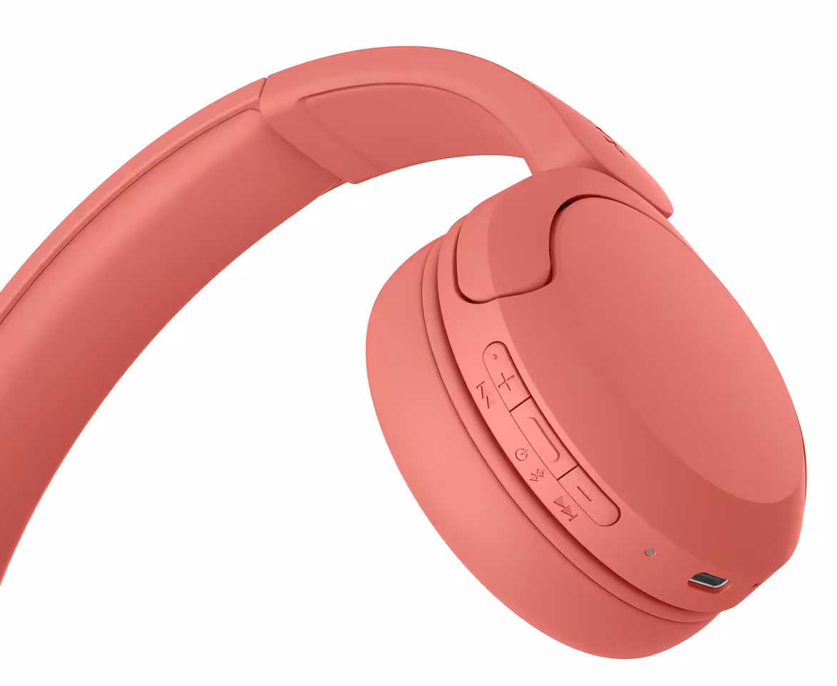 Casque Sony WH-1000XM4 rose, vue de trois quarts avec commandes visibles sur l’oreillette