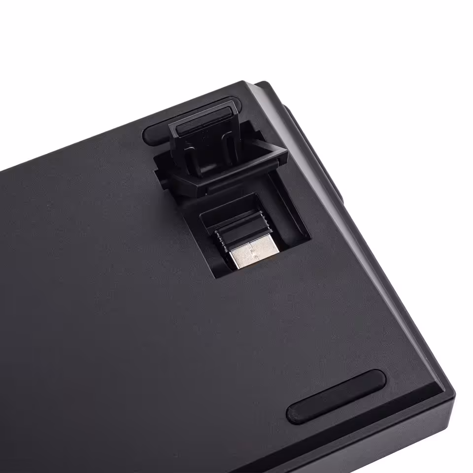 Epomaker HE60 : un clavier magnétique sans fil 8 kHz proposé à moins de 60 dollars 4 Dessous du clavier Epomaker HE60 montrant pied rabattable, récepteur USB et patin antidérapant